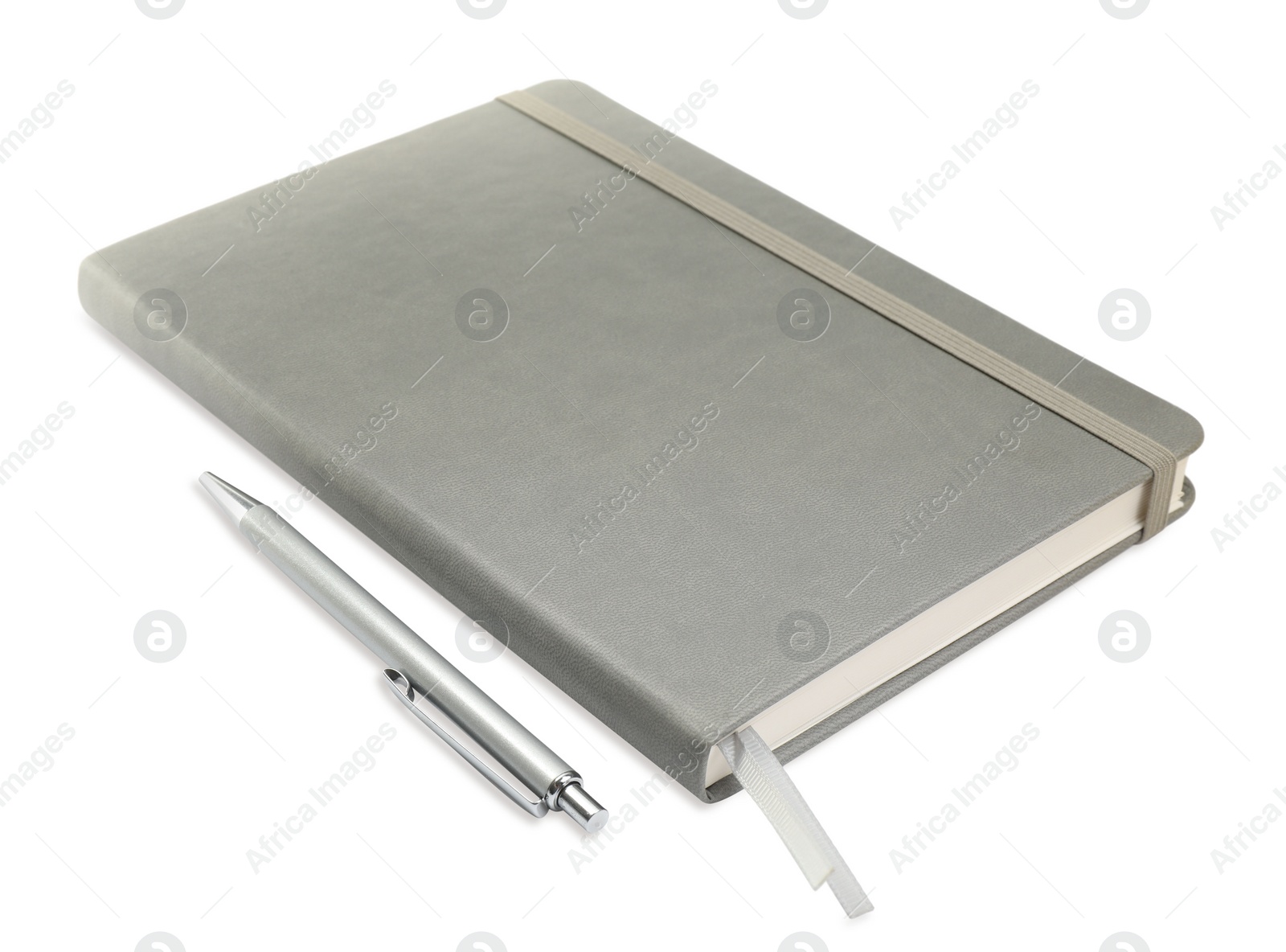 Photo of Closed grey notebook with pen isolated on white