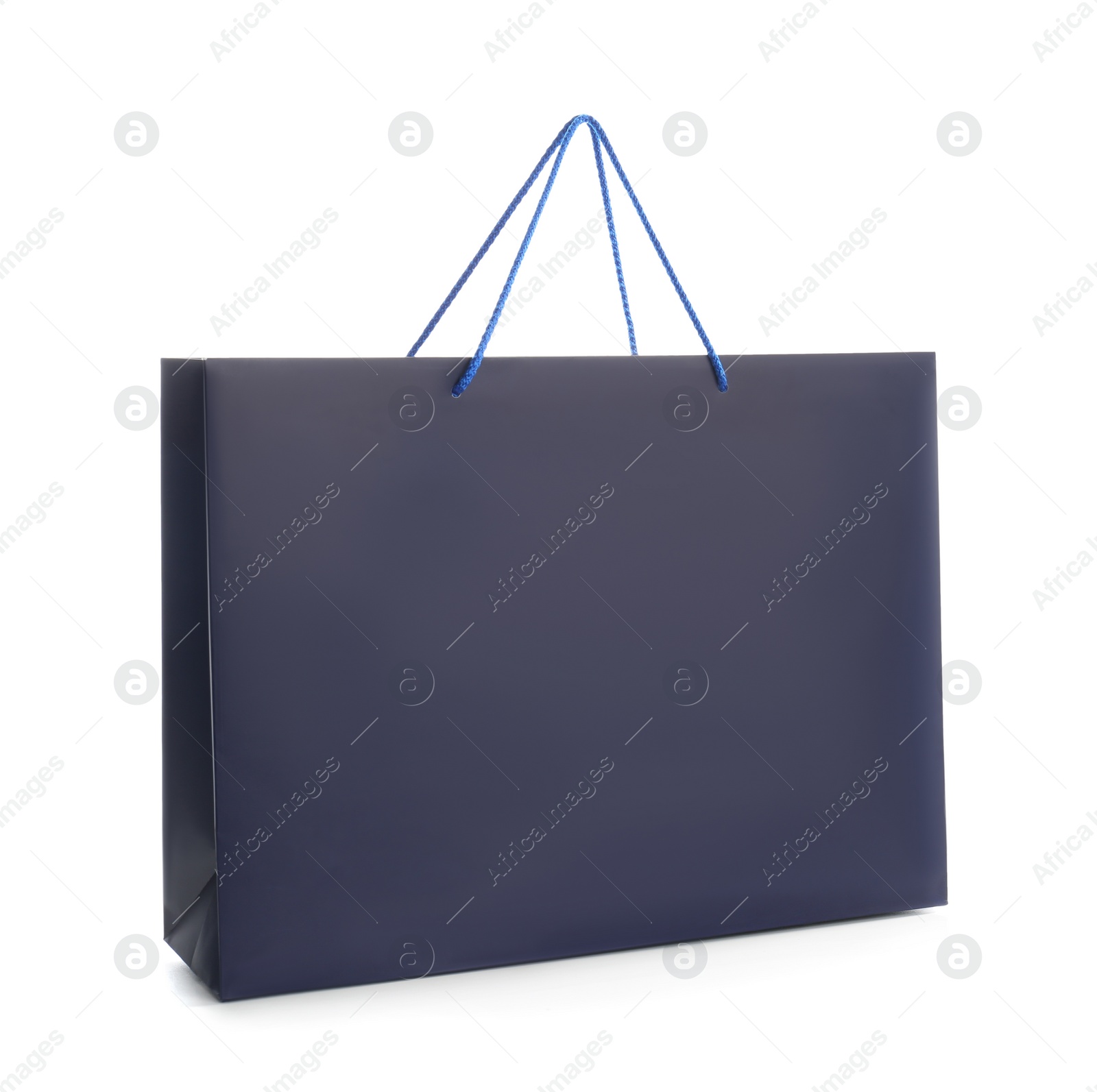 Photo of Dark blue paper shopping bag isolated on white