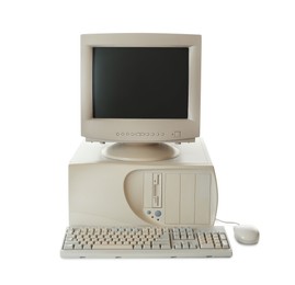 Photo of Old computer monitor, keyboard, system unit and mouse on white background