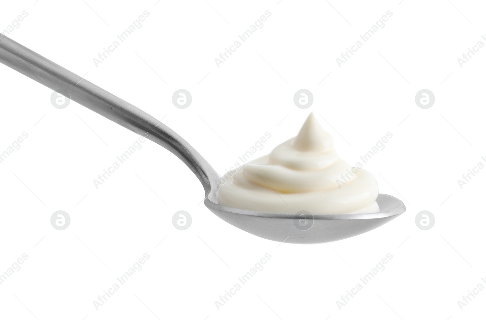 Photo of Silver spoon with mayonnaise isolated on white