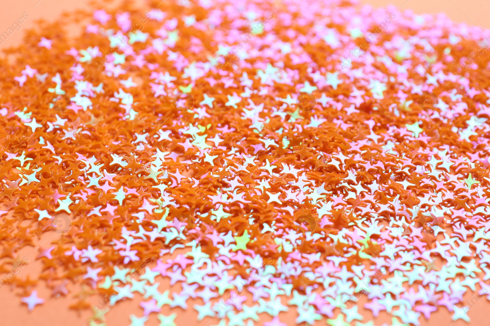 Photo of Shiny bright glitter as background, closeup view