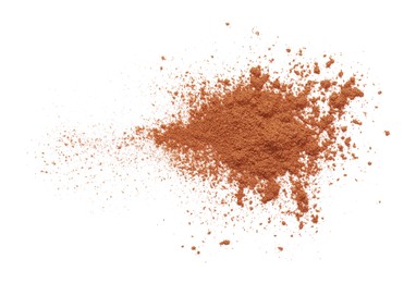 Dry aromatic cinnamon powder isolated on white, top view