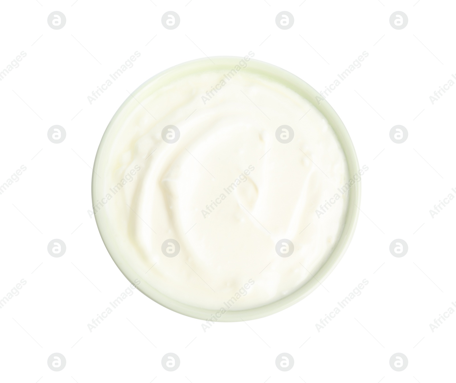 Photo of Tasty organic yogurt in bowl isolated on white, top view