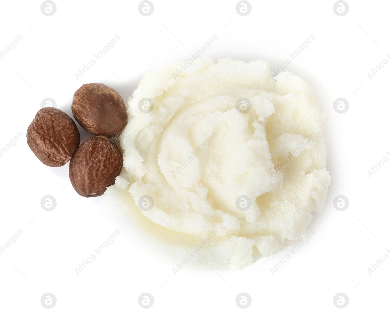 Photo of Fresh shea butter and nuts isolated on white, top view