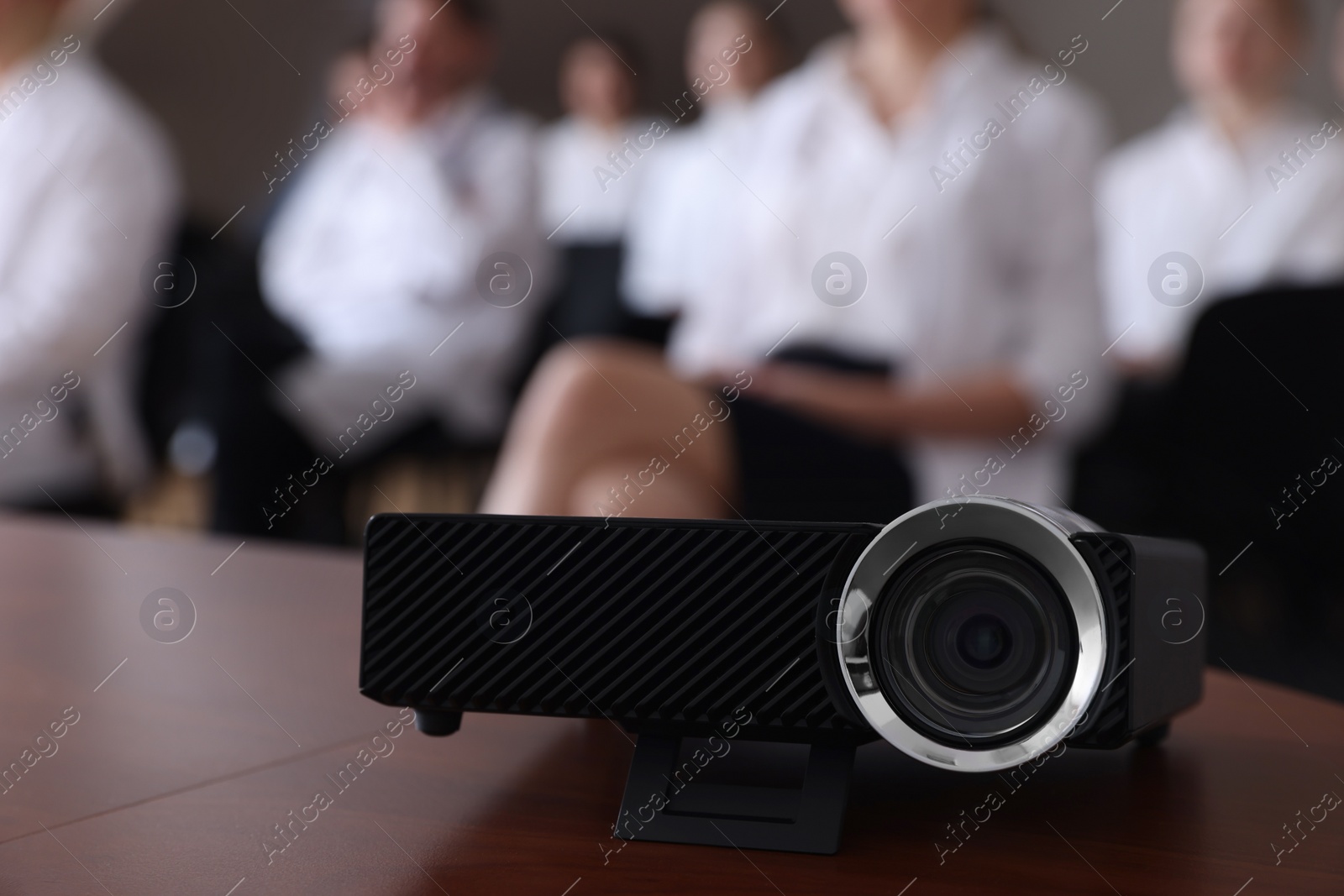 Photo of Video projector on table during medical conference