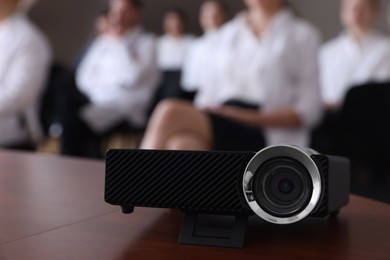 Photo of Video projector on table during medical conference