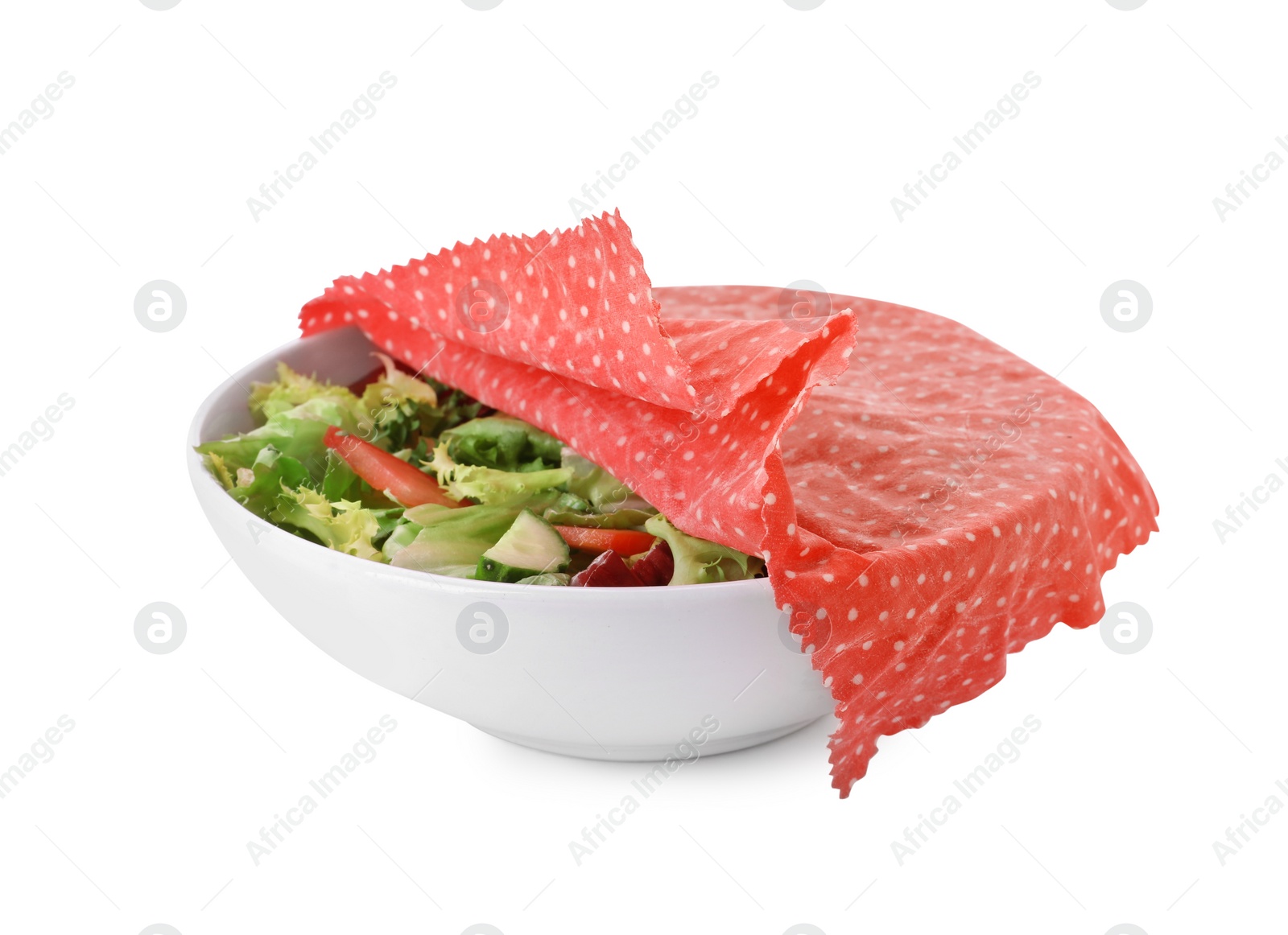 Photo of Bowl of tasty salad covered with beeswax food wrap isolated on white