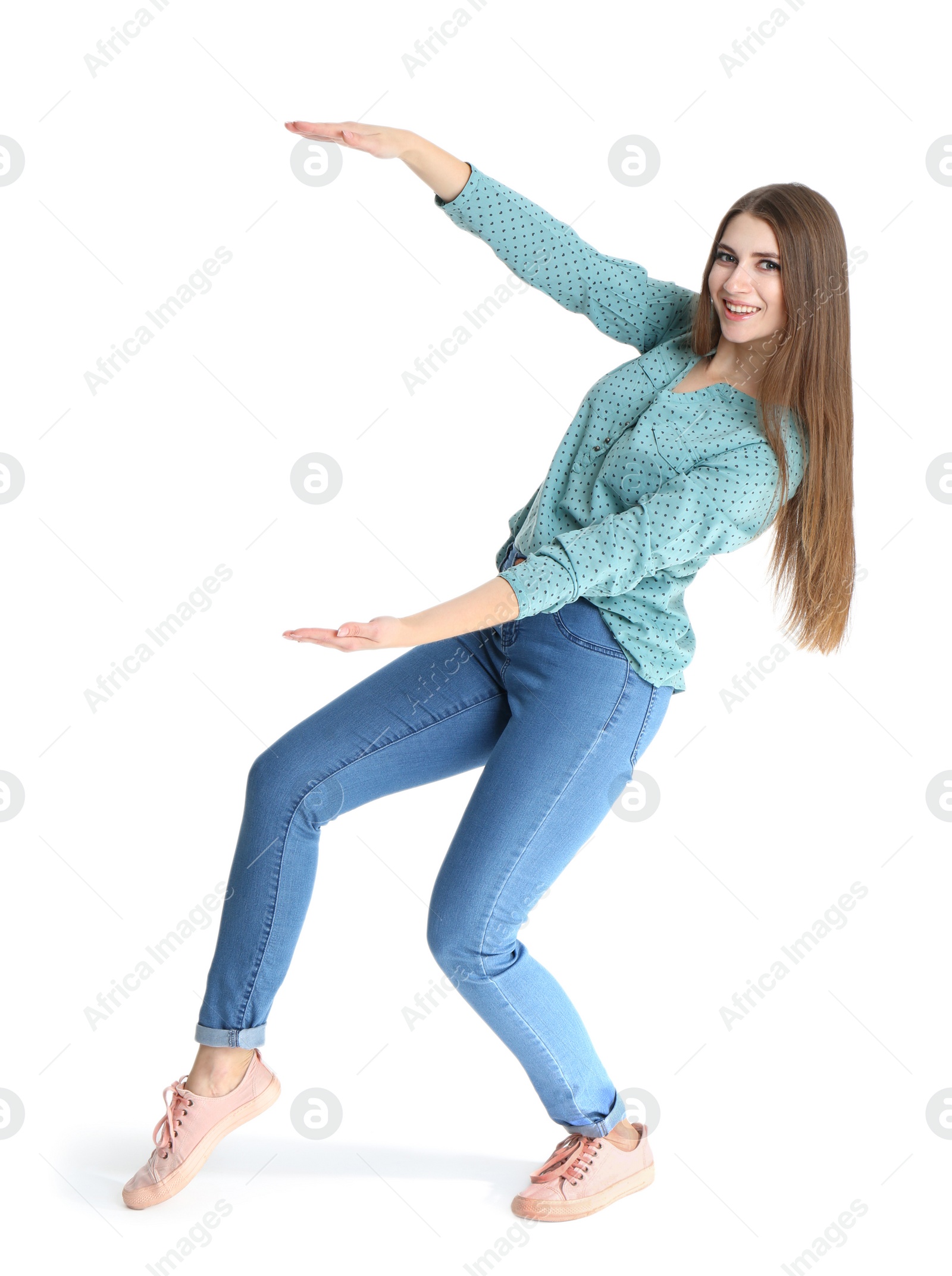 Photo of Young woman with magnet attracting people on white background