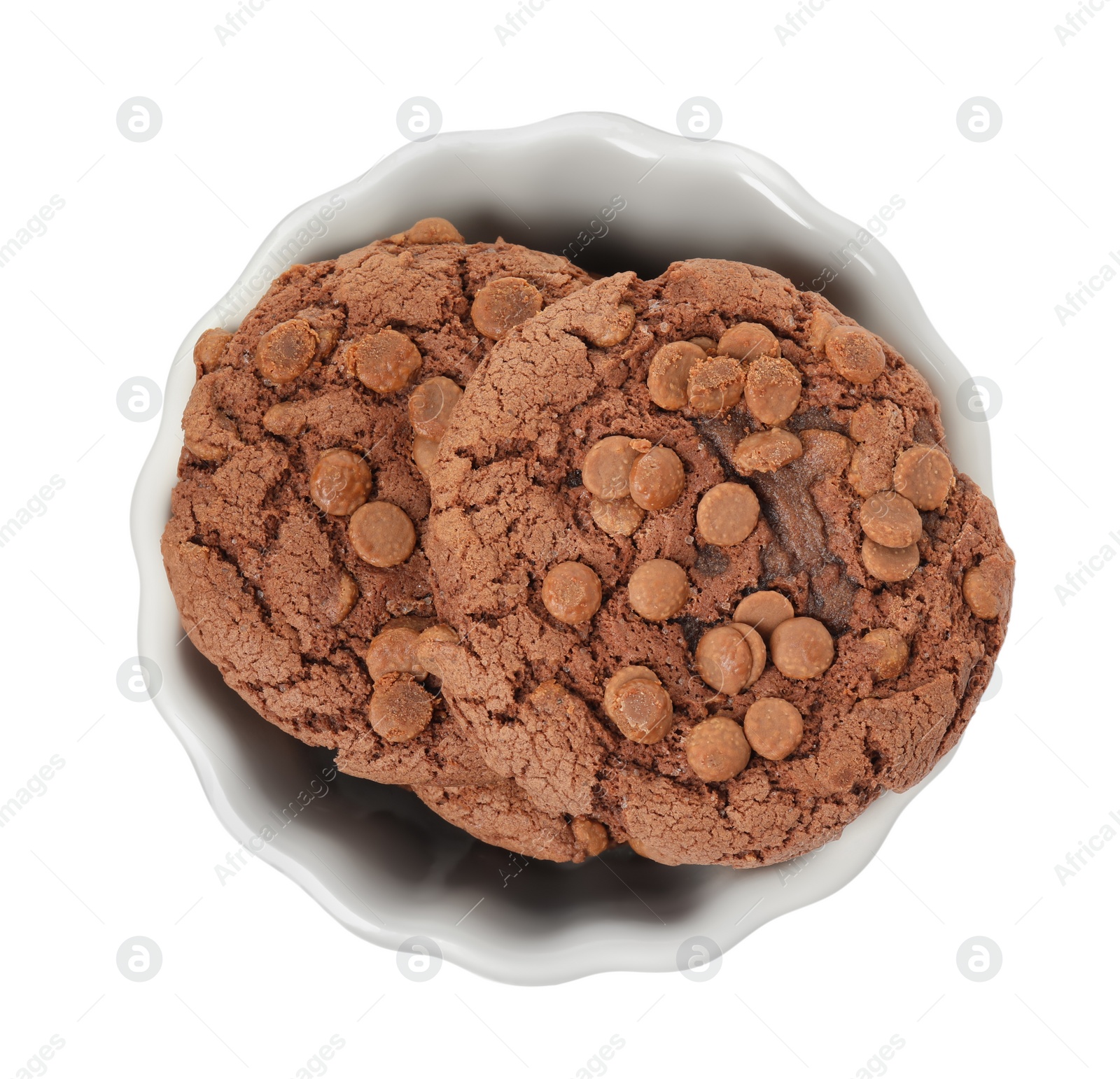 Photo of Delicious chocolate chip cookies in bowl isolated on white, top view