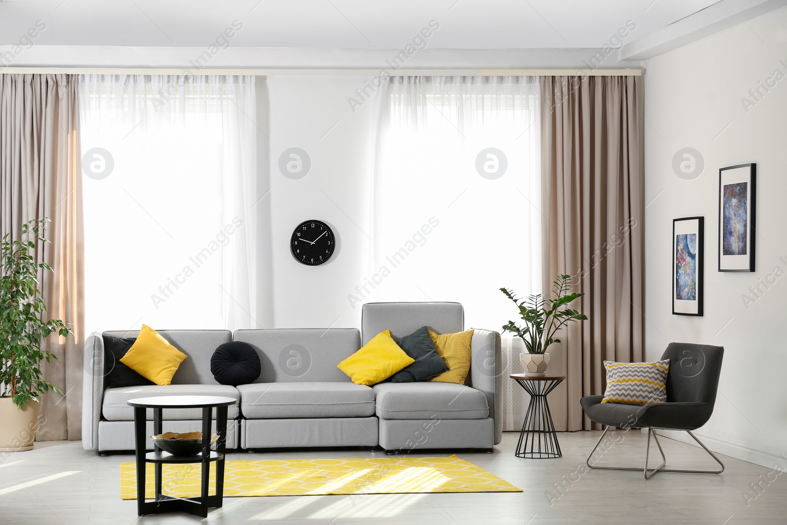 Photo of Stylish living room interior with comfortable sofa. Space for text