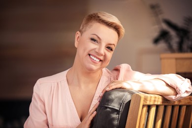 Portrait of beautiful happy woman at home