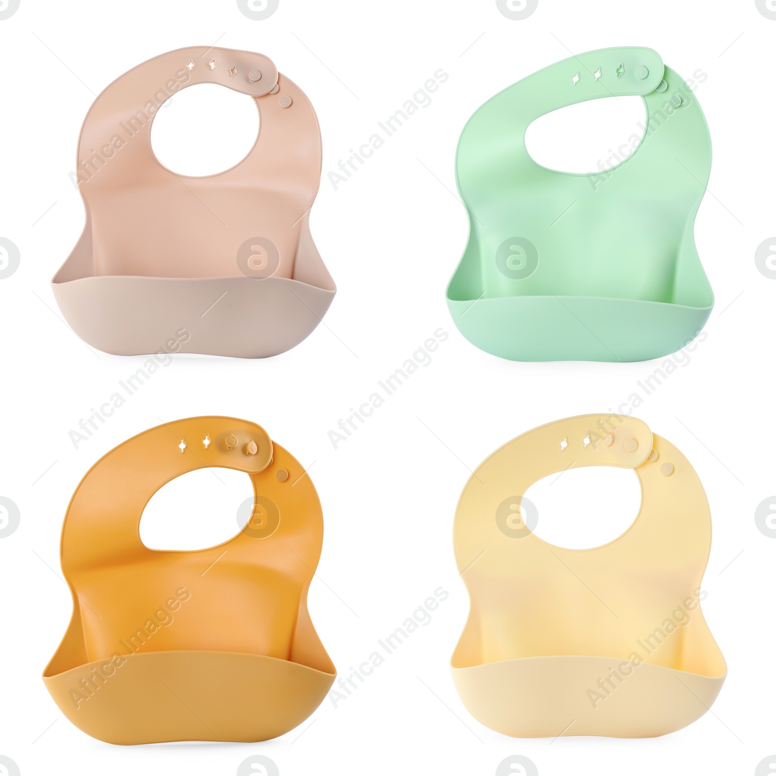 Image of Set with different silicone baby bibs on white background, top view