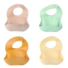 Set with different silicone baby bibs on white background, top view