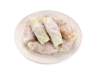 Photo of Plate with uncooked stuffed cabbage rolls isolated on white