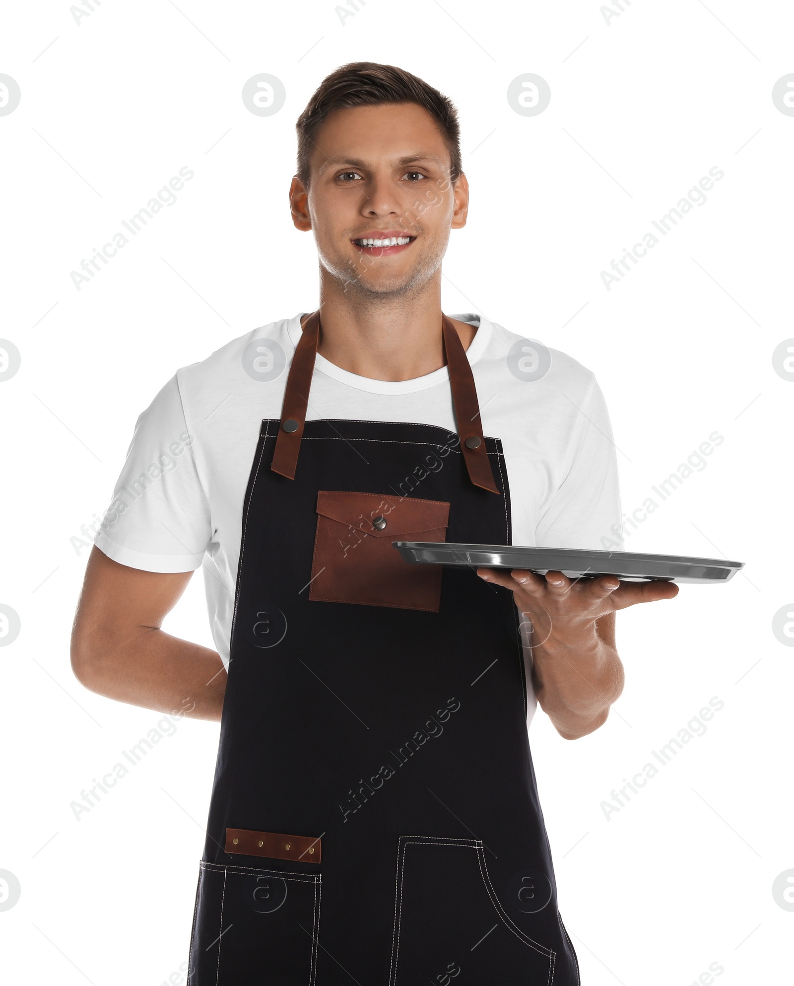 Photo of Portrait of happy young waiter with tray on white background