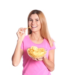 Woman eating potato chips on white background