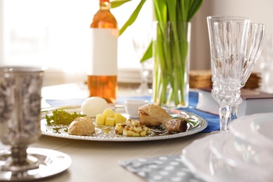 Photo of Table served for Passover (Pesach) Seder indoors