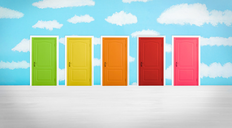 Image of Many colorful doors in room. Concept of choice 