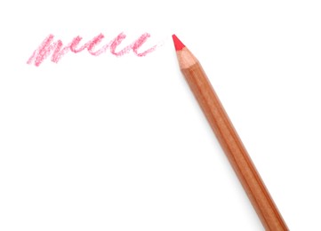 Photo of Pink pastel pencil and scribble isolated on white, top view. Drawing supply