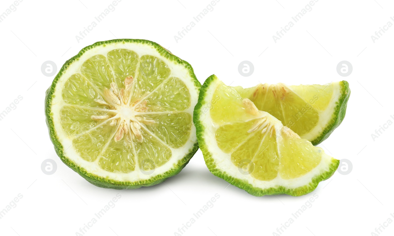 Photo of Cut ripe bergamot fruit on white background