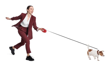 Image of Smiling businesswoman walking with dog on white background