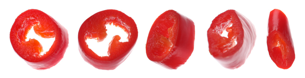 Image of Red hot chili pepper pieces on white background