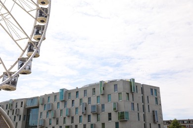 Photo of Cologne, Germany - August 28, 2022: Picturesque view of Ferris wheel in city, space for text