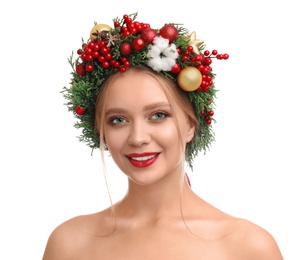 Photo of Beautiful young woman wearing Christmas wreath on white background
