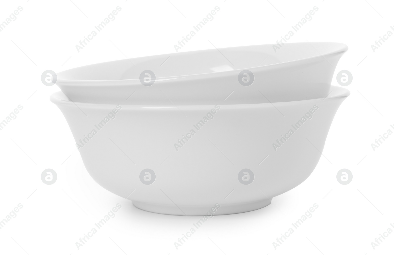 Photo of Clean bowls on white background. Washing dishes