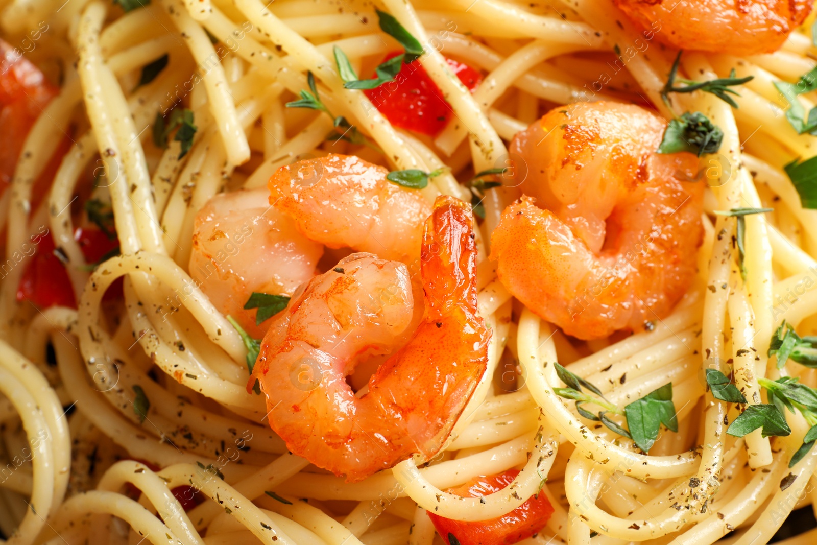 Photo of Delicious pasta with shrimps, closeup