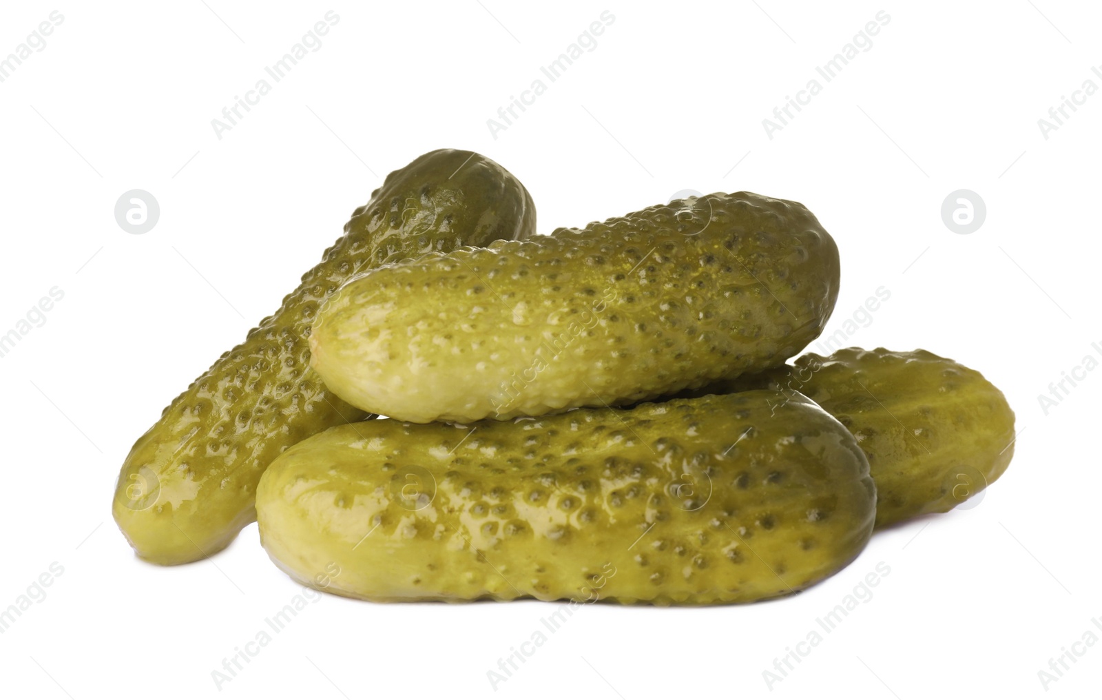 Photo of Pile of tasty pickled cucumbers on white background