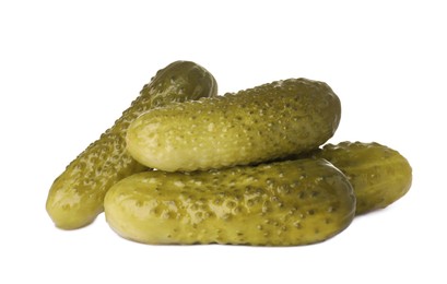 Pile of tasty pickled cucumbers on white background