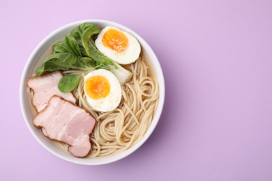 Photo of Delicious ramen with meat on violet background, top view and space for text. Noodle soup