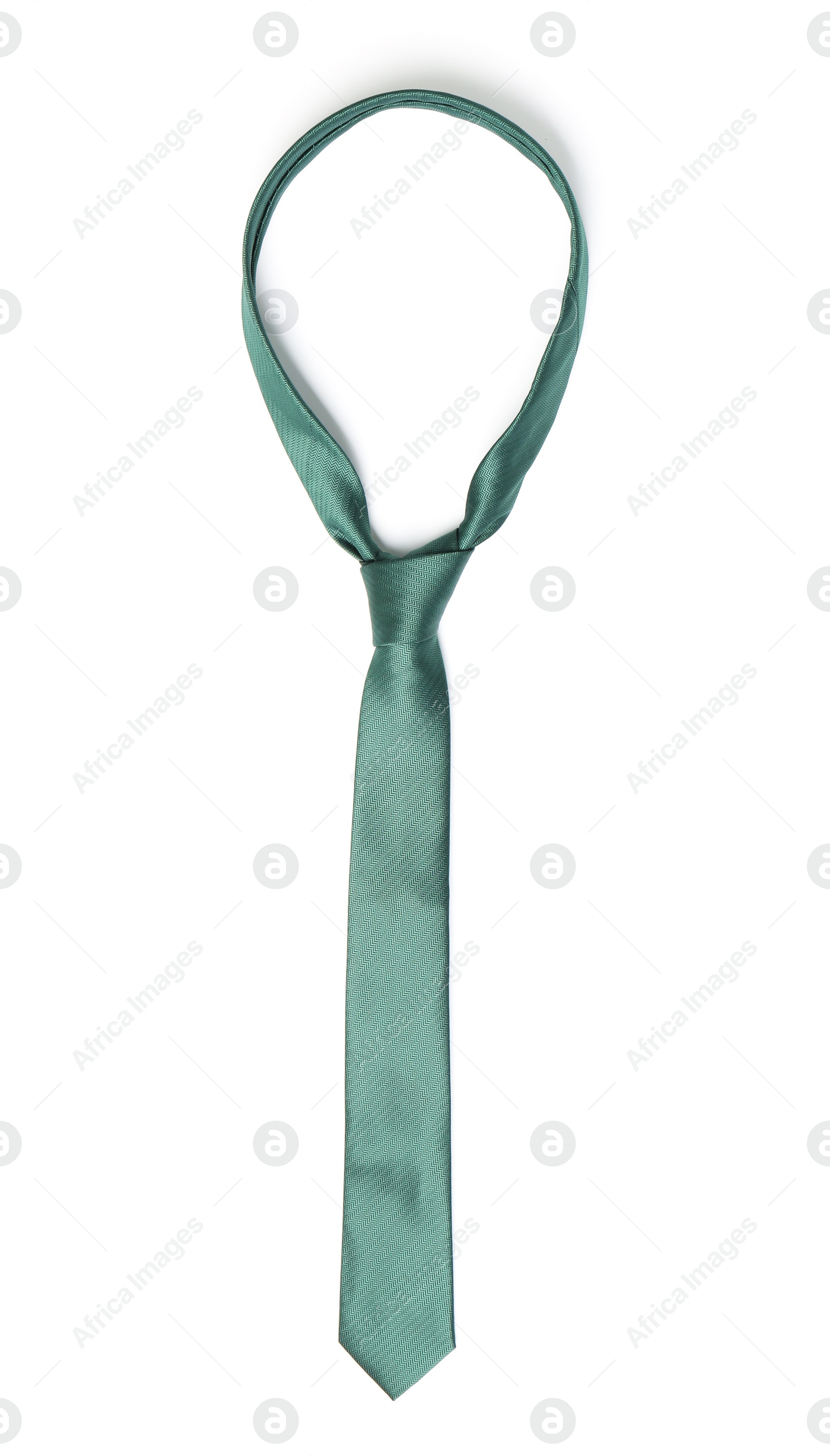 Photo of Green male tie isolated on white, top view