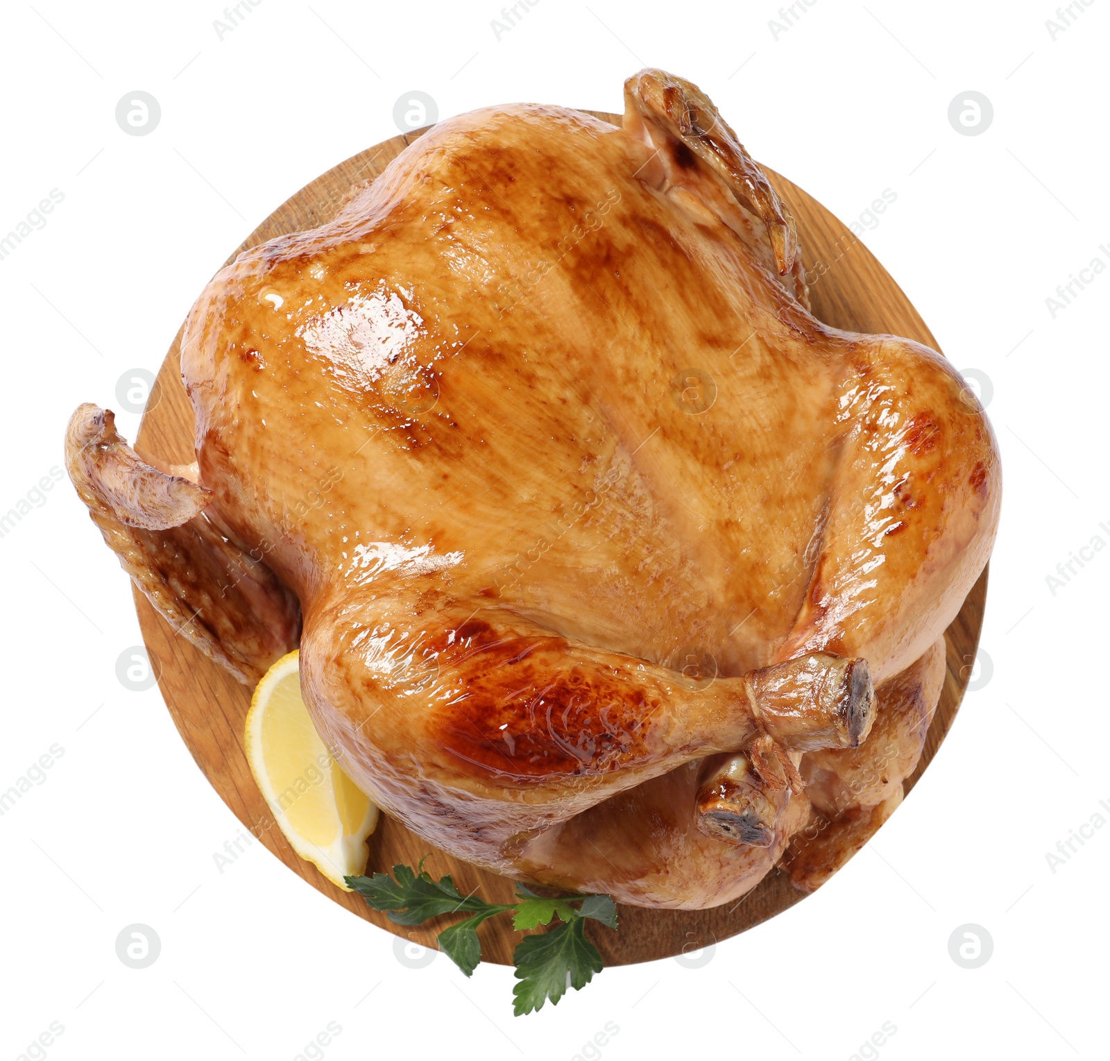 Photo of Tasty roasted chicken with parsley and lemon isolated on white, top view