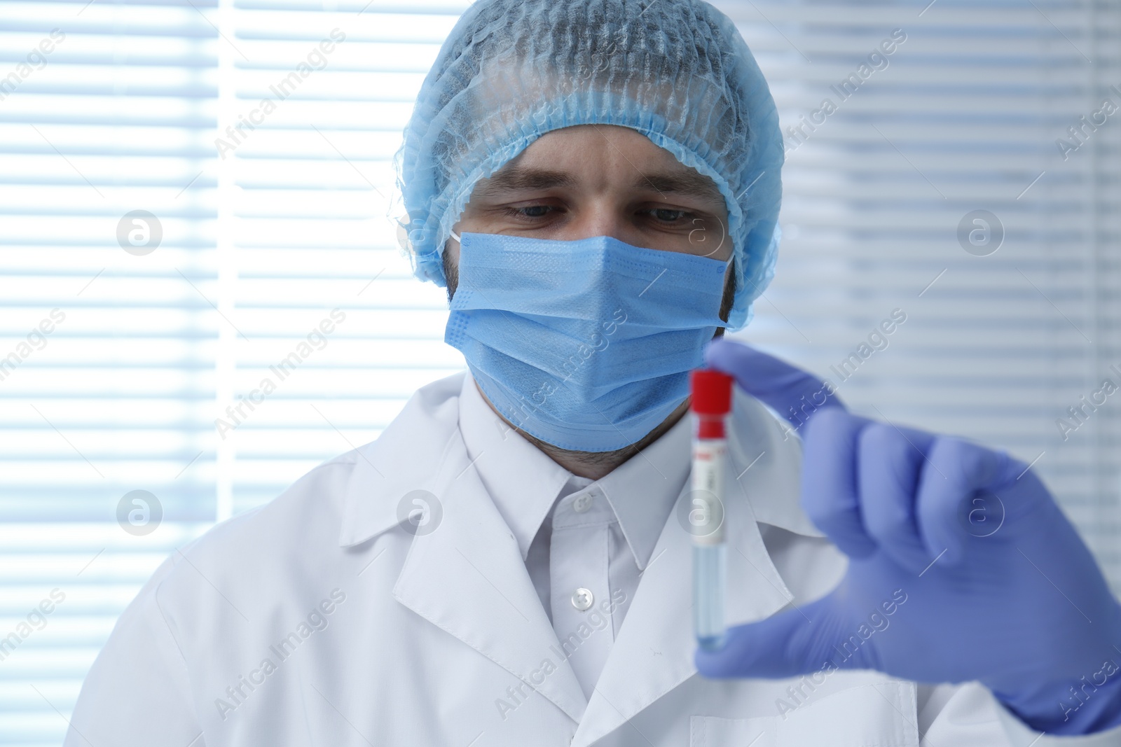 Photo of Scientist working with sample in laboratory. Medical research