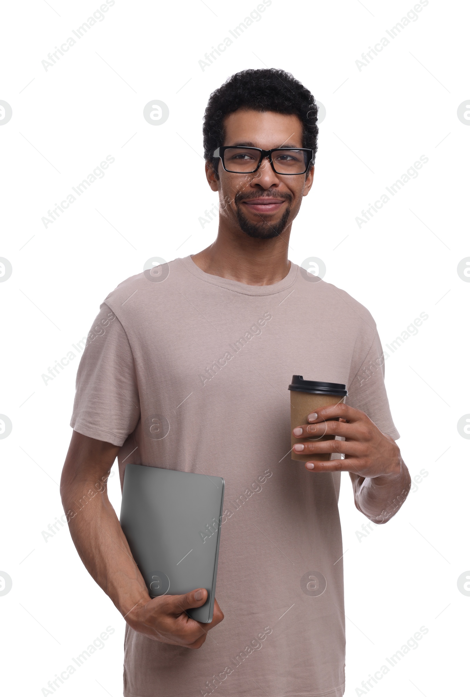 Photo of Handsome man with laptop and cup of coffee on white background