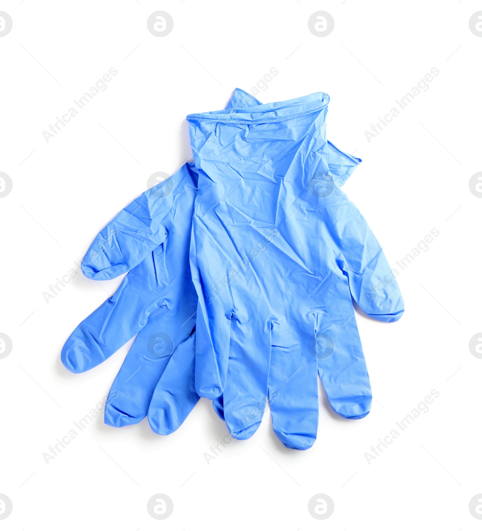 Photo of Pair of medical gloves isolated on white, top view