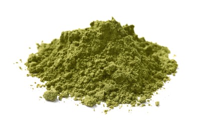 Photo of Heap of henna powder isolated on white