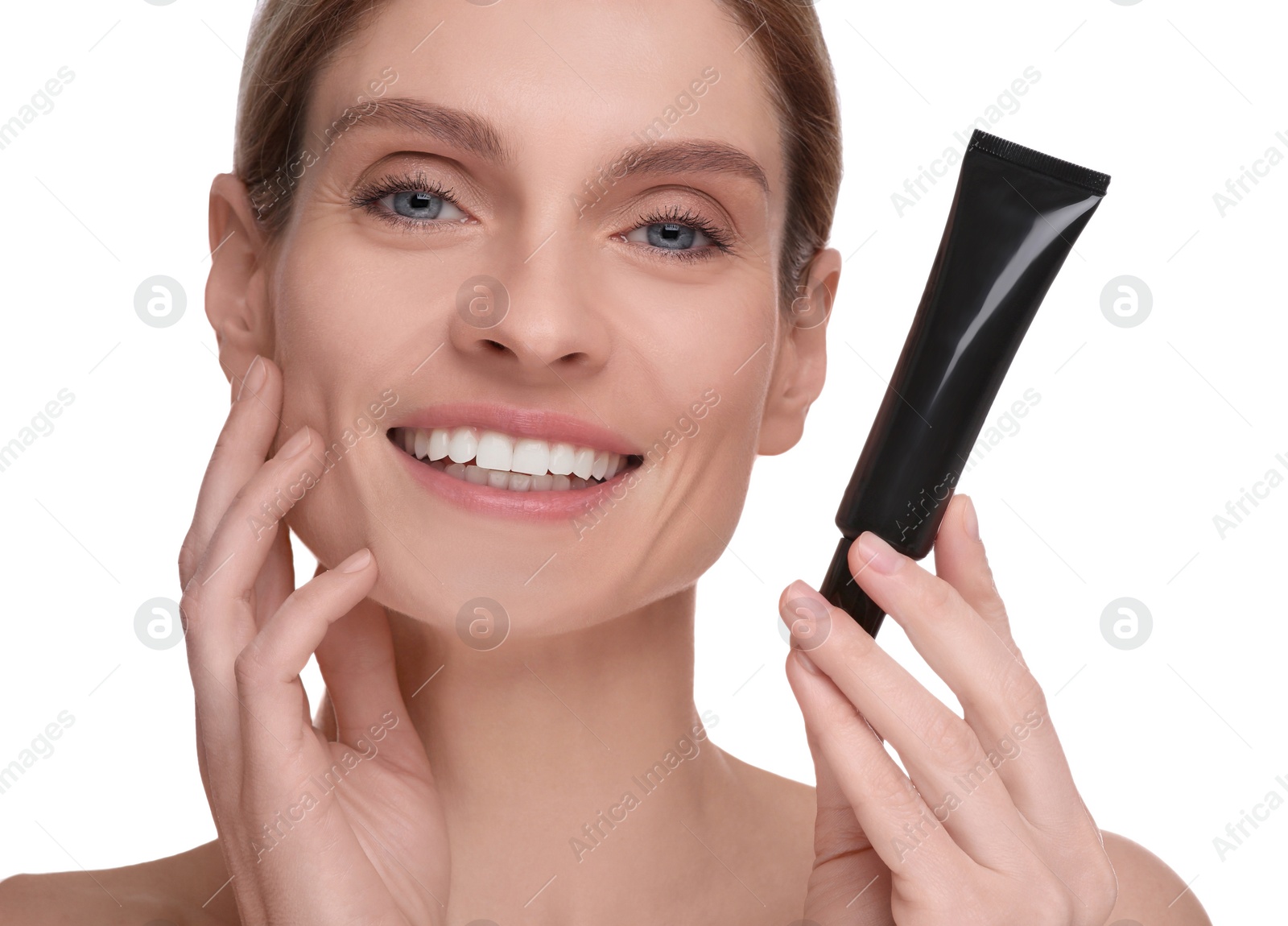 Photo of Woman holding tube with foundation on white background