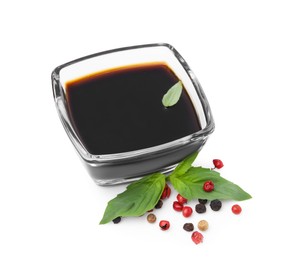 Photo of Organic balsamic vinegar, basil and pepper isolated on white