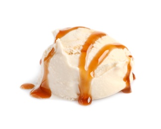 Tasty ice cream ball with caramel sauce on white background