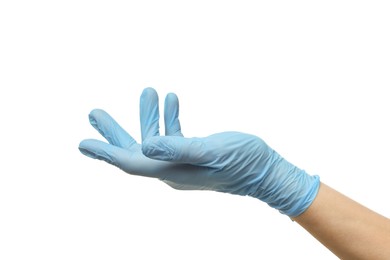 Photo of Doctor wearing light blue medical glove holding something on white background, closeup