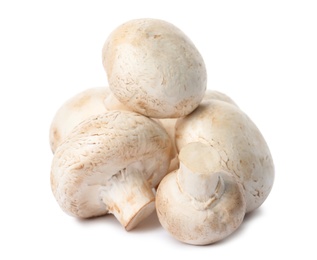 Photo of Fresh champignon mushrooms isolated on white. Healthy food