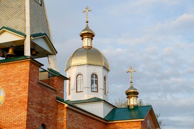 Photo of Beautiful view of village church against blue sky