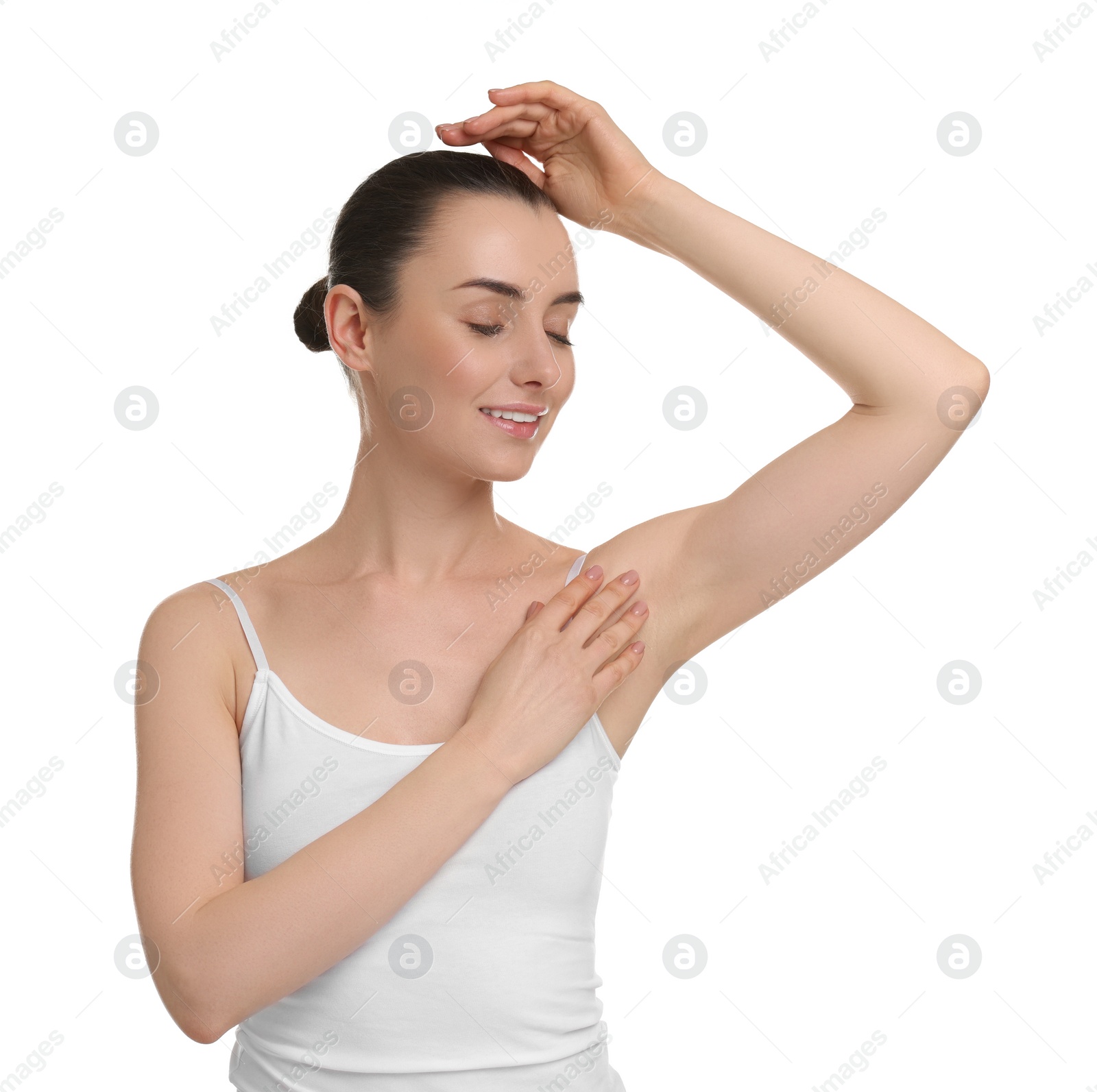 Photo of Beautiful woman showing armpit with smooth clean skin on white background