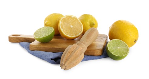 Photo of Wooden citrus reamer, fresh lemons and lime on white background