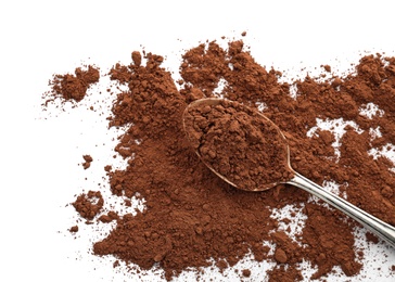 Photo of Spoon with cocoa powder on white background