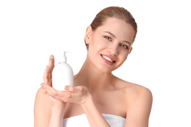 Photo of Young woman with bottle of hand cream on white background