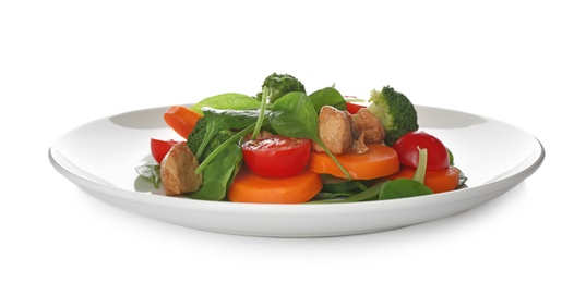 Photo of Delicious fresh chicken salad with vegetables and spinach isolated on white